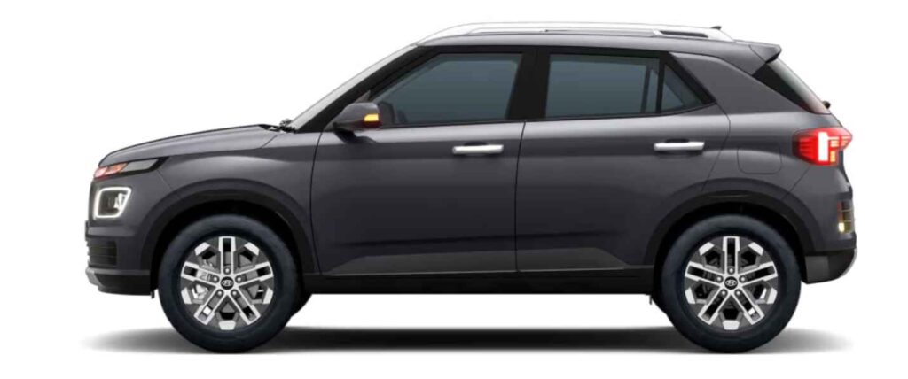 Side profile of the 2025 Hyundai Venue with dual-tone roof and new alloy wheels